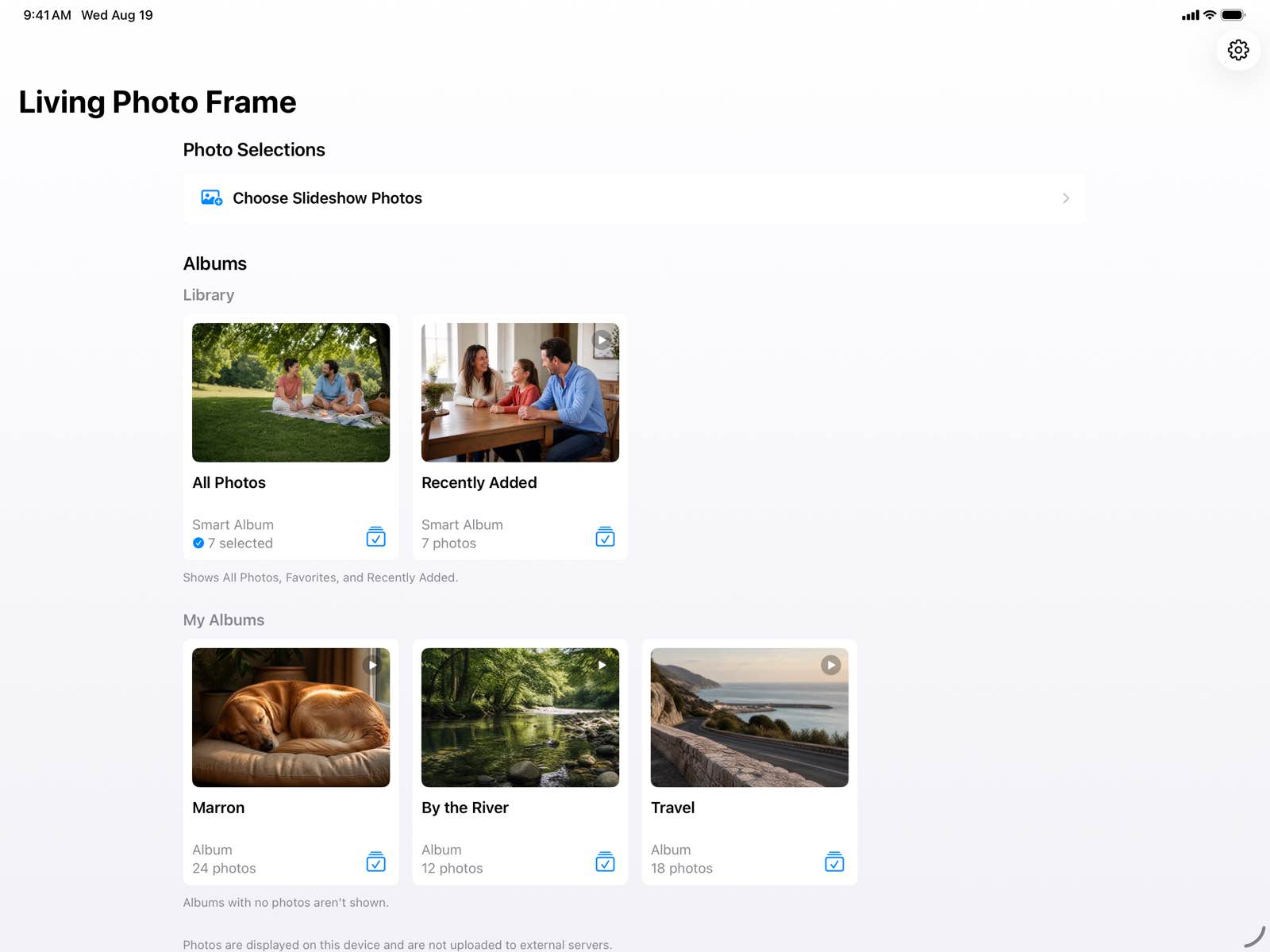 The app’s album list. Smart Albums and My Albums are laid out as selectable cards, with a note at the bottom saying photos are displayed on this device and are not uploaded to external servers.
